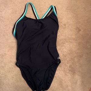 Women’s size 10 Reebok swim suit. Excellent condition, no pulls